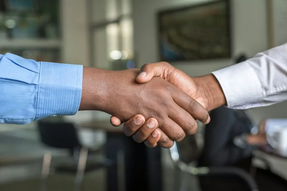Adviser greeting a client